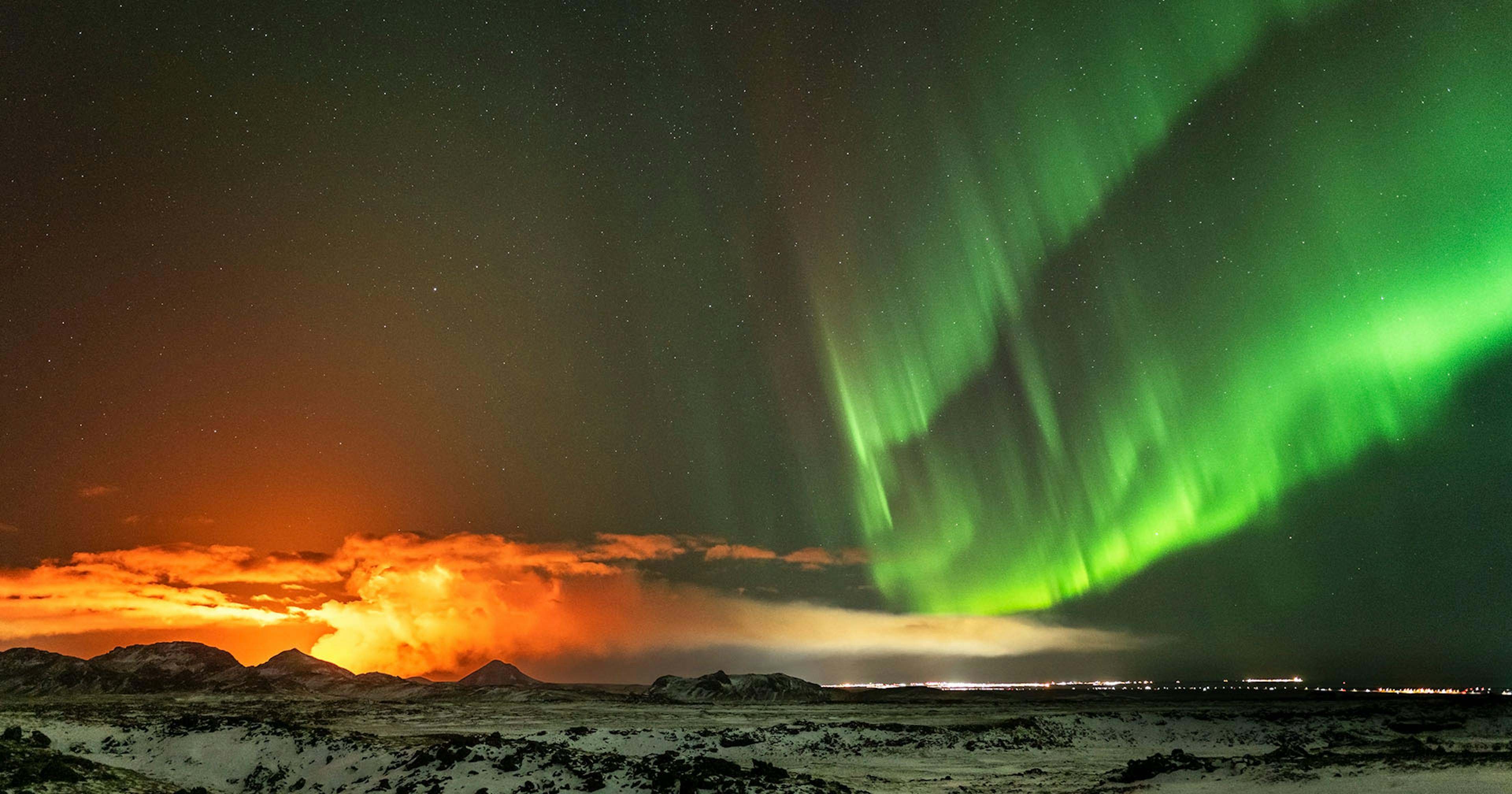 Volcanic eruption and Northern Lights over Reykjanes peninsula in November 2024. Credit: Gísli Már Árnason / Iceland at Night