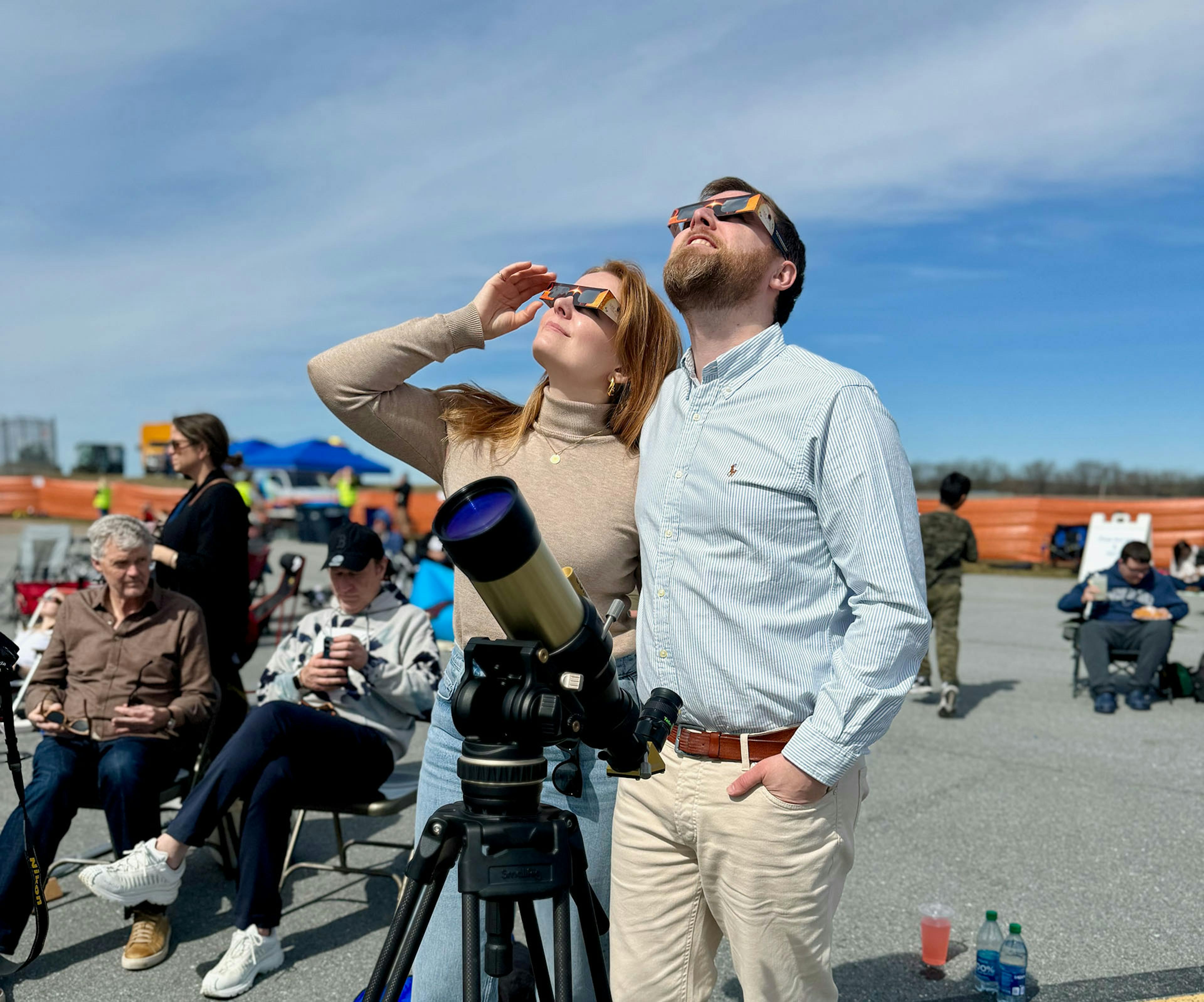 Watching solar eclipse using eclipse glasses. Credit. Sævar Helgi Bragason