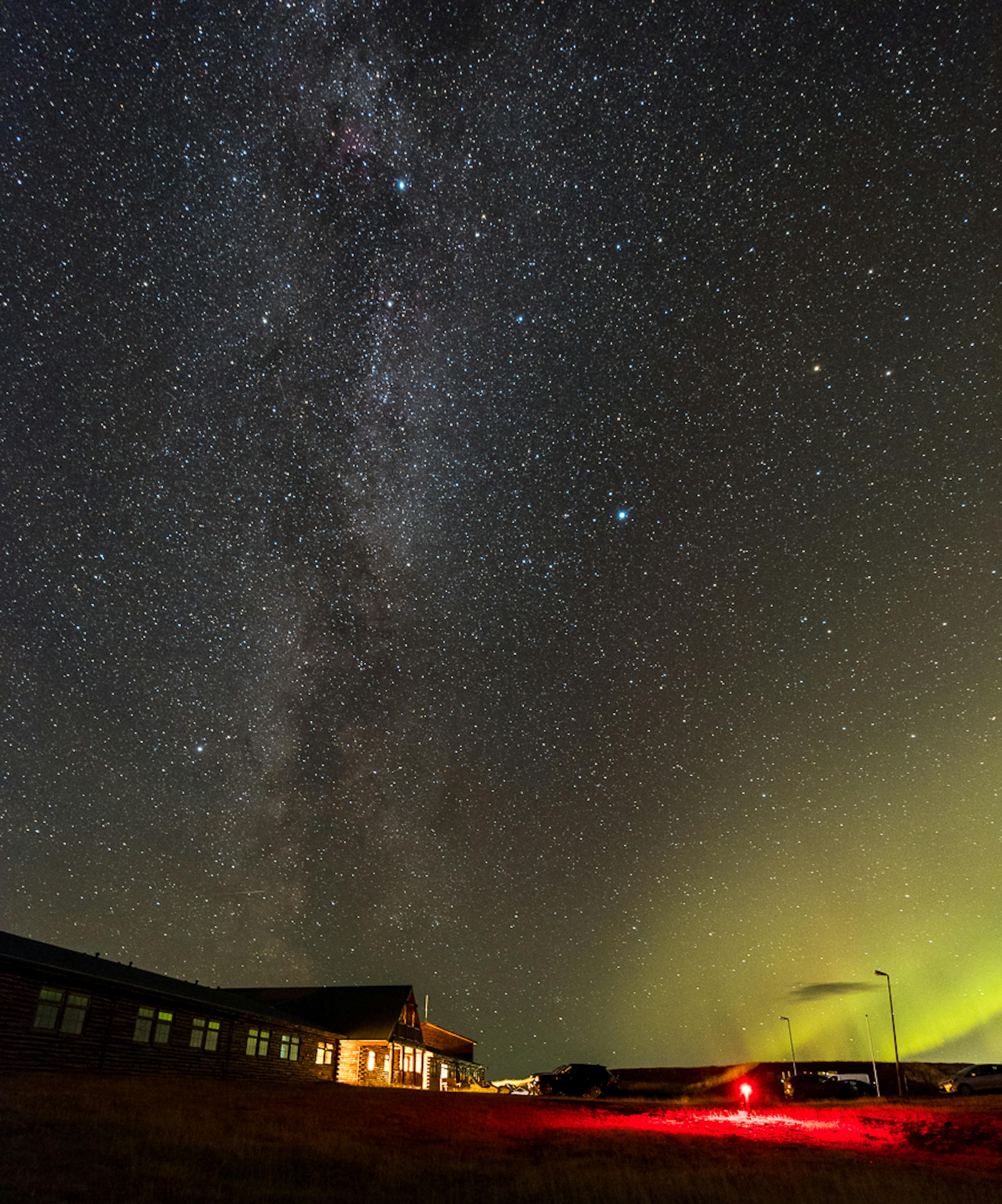 The Milky Way and Northern Lights above Hótel Rangá in south Iceland. 