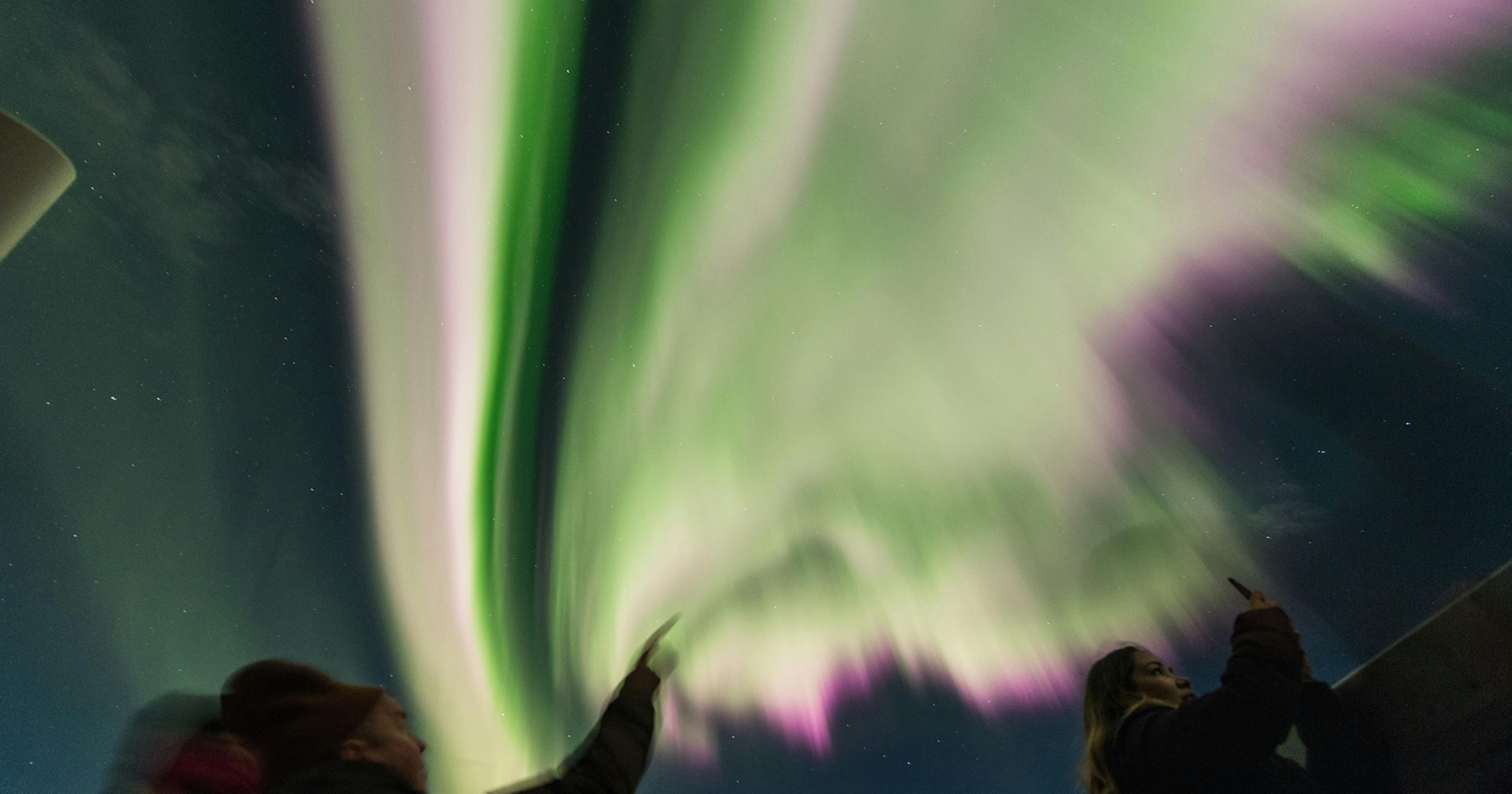 People observing aurora 