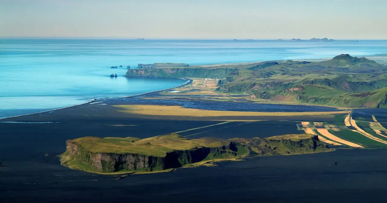 Vík from above Mýrdalssandur. Credit: Visit South Iceland