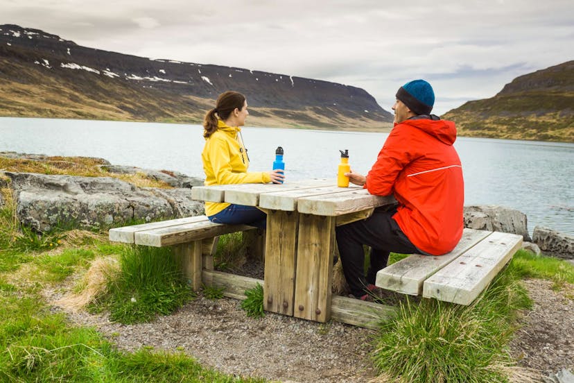 Couple camping in Iceland by beautiful scenery