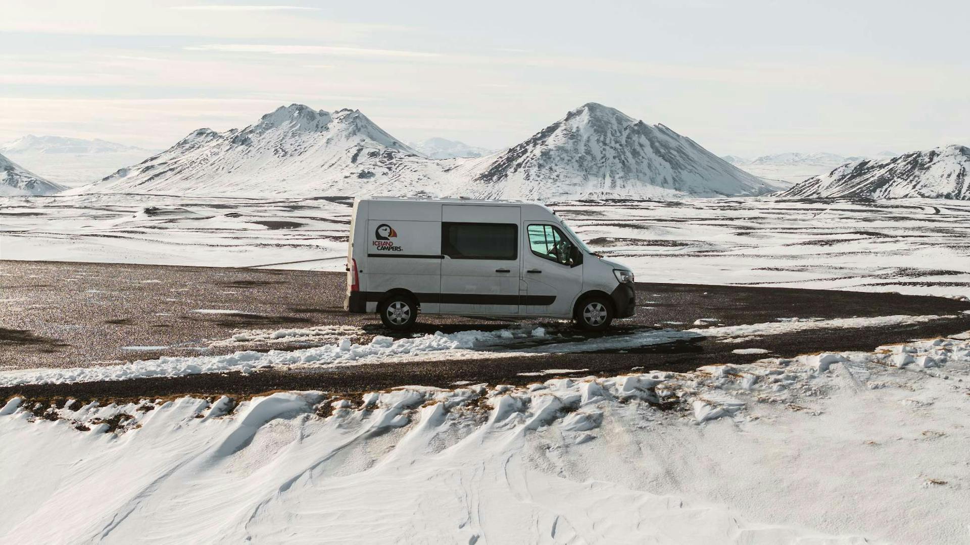 Campervan in snowy landscape in Iceland