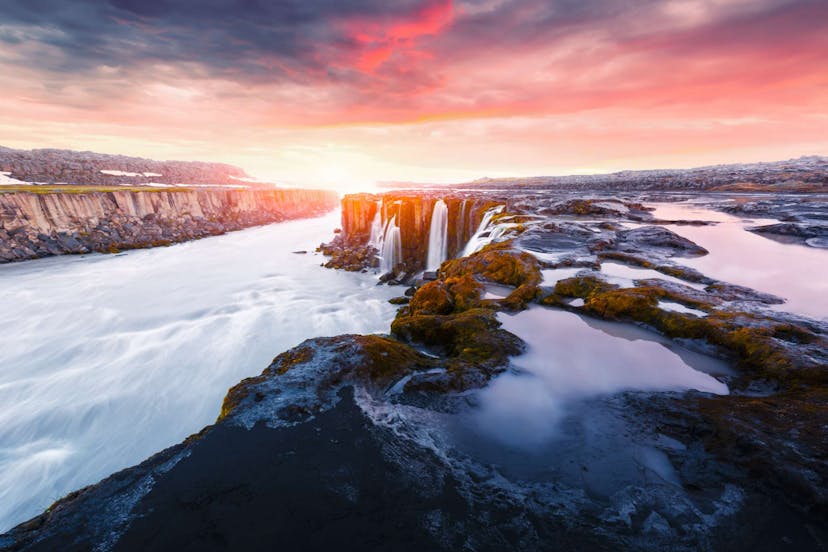 Iceland waterfall at sunset