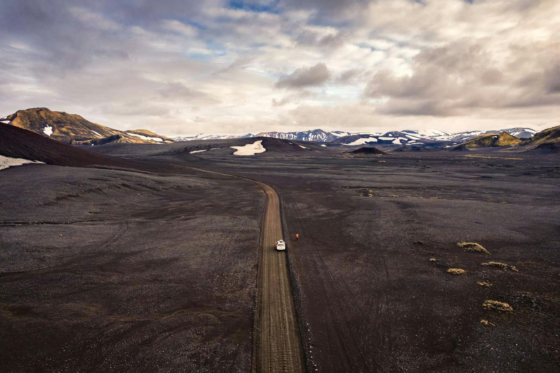 Aerial view of car driving on the Icelandic road