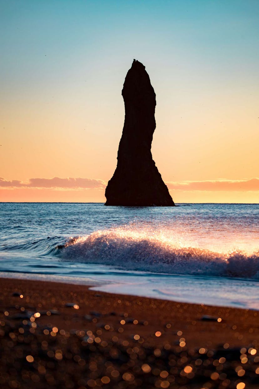 Iceland black sand beach at sunset
