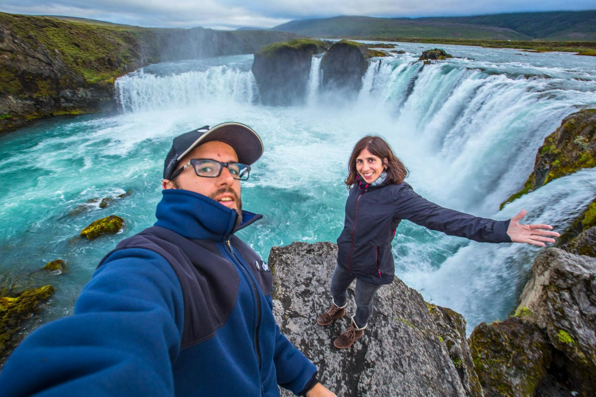 Couple by Iceland waterfall