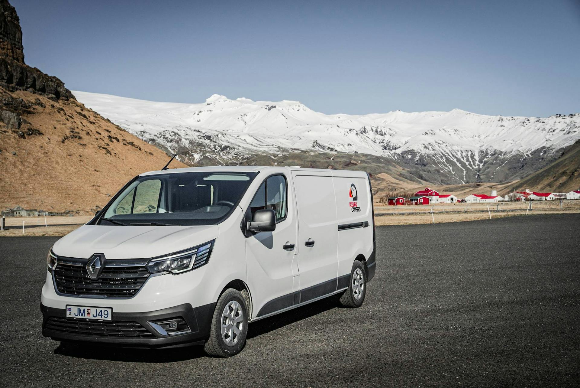 Iceland Campervan parked in front of mountains