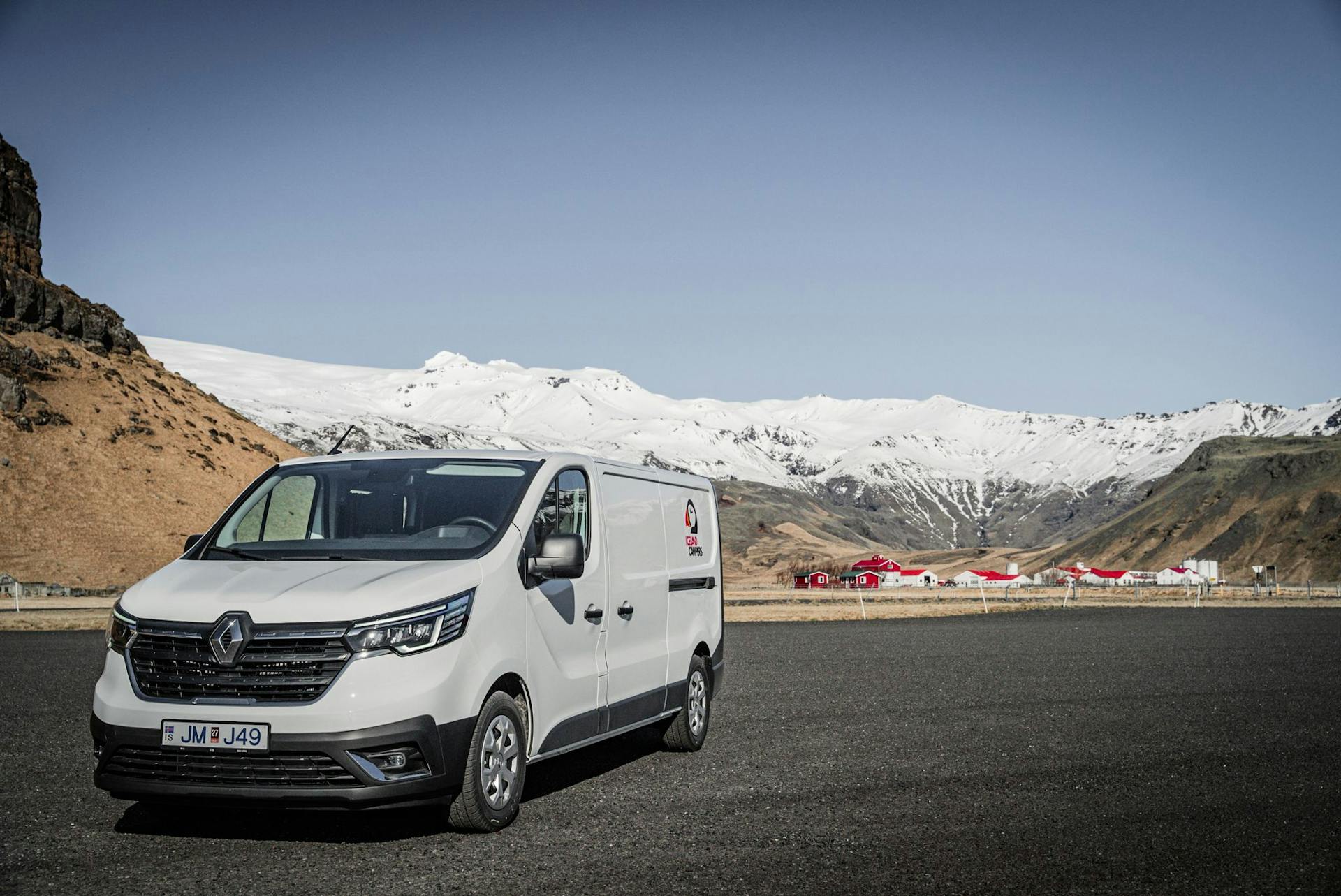 Iceland Campervan parked in front of mountains