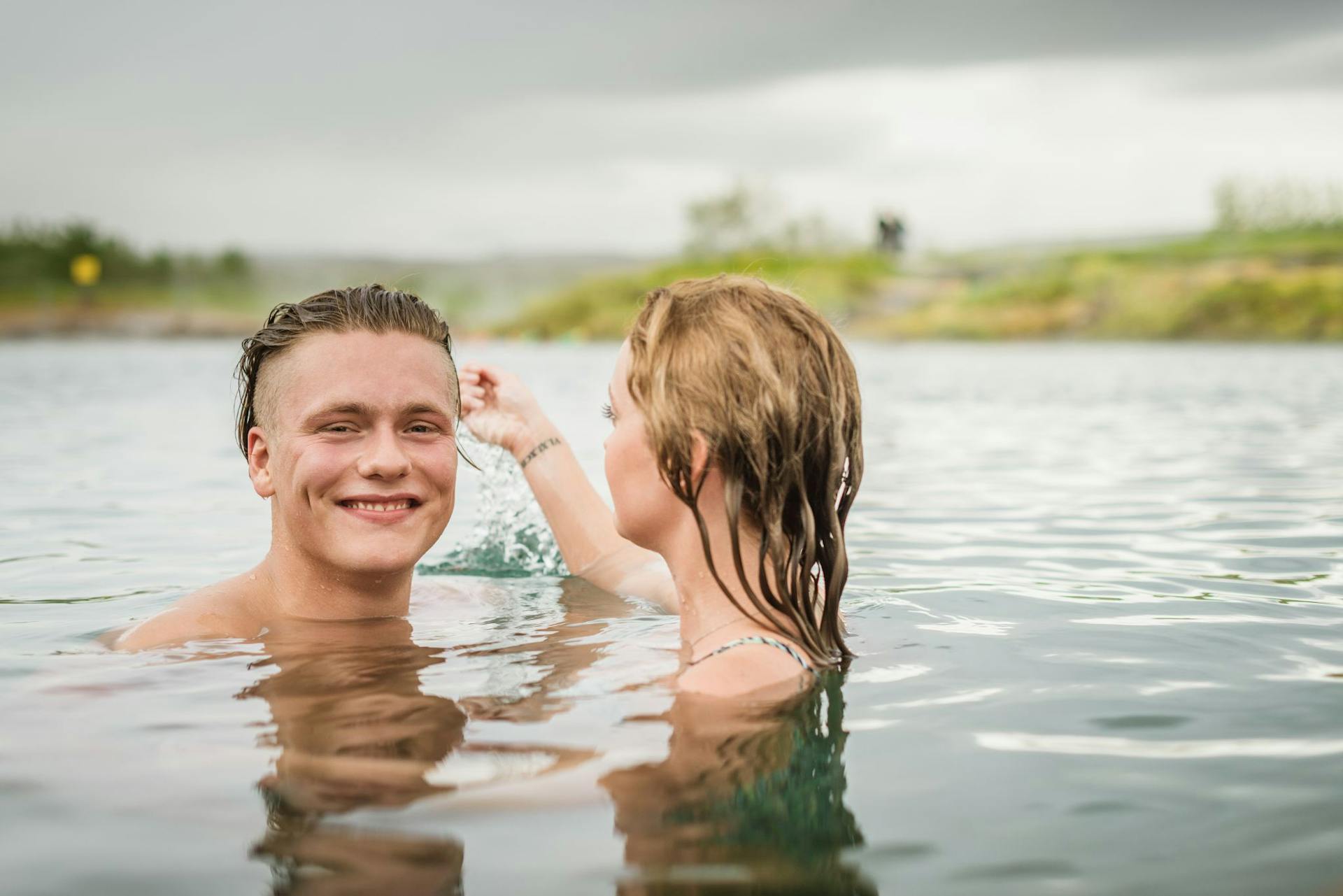 Couple in Iceland nature baths