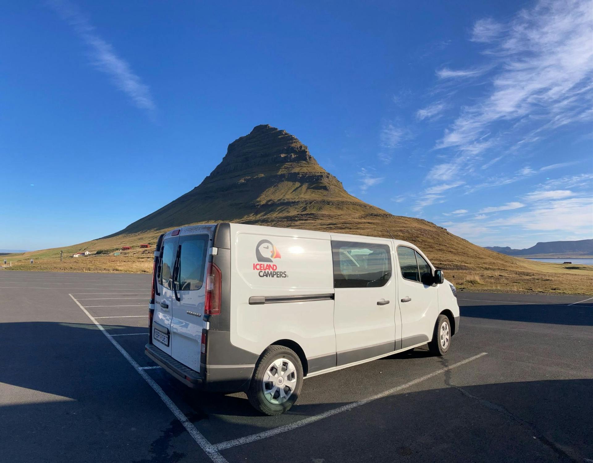 Iceland Camper van parked in front of Kirkjufell mountain