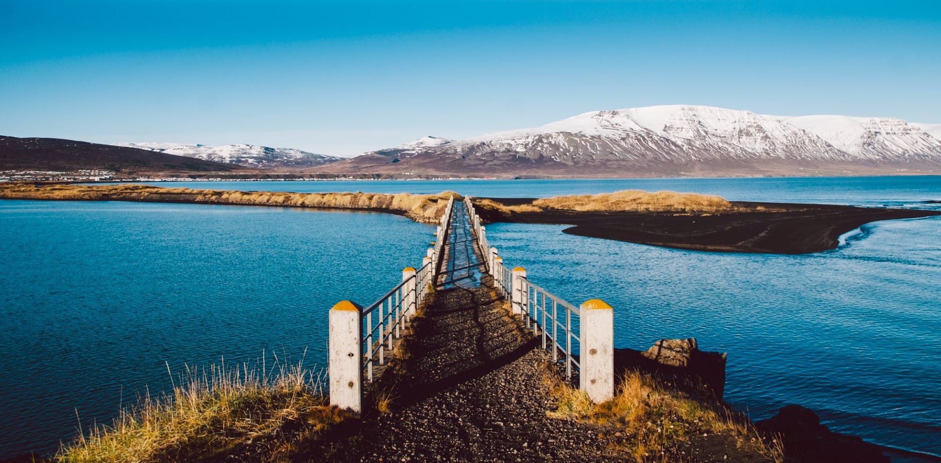 Iceland bridge in front of mountains