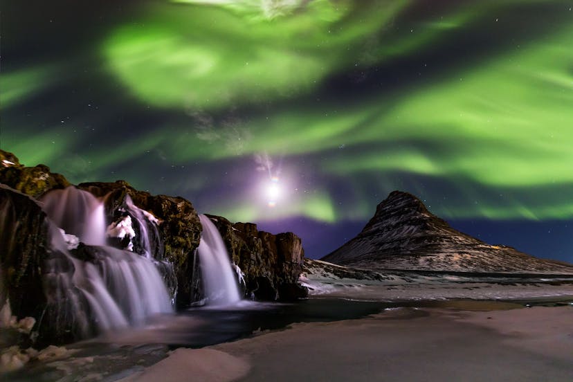 Northern lights above Kirkjufell mountain in Iceland