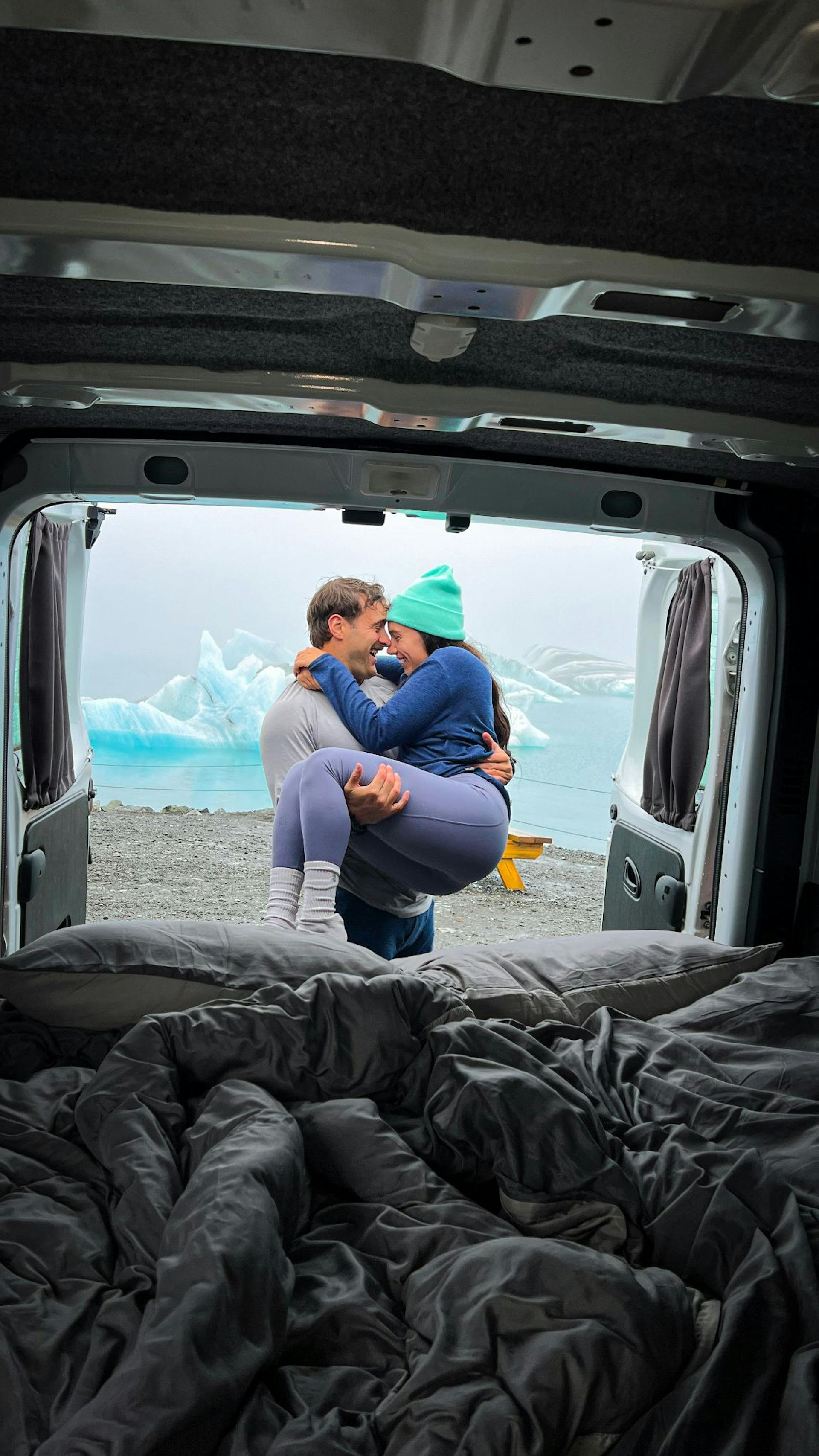 Couple in campervan at glacier lagoon iceland
