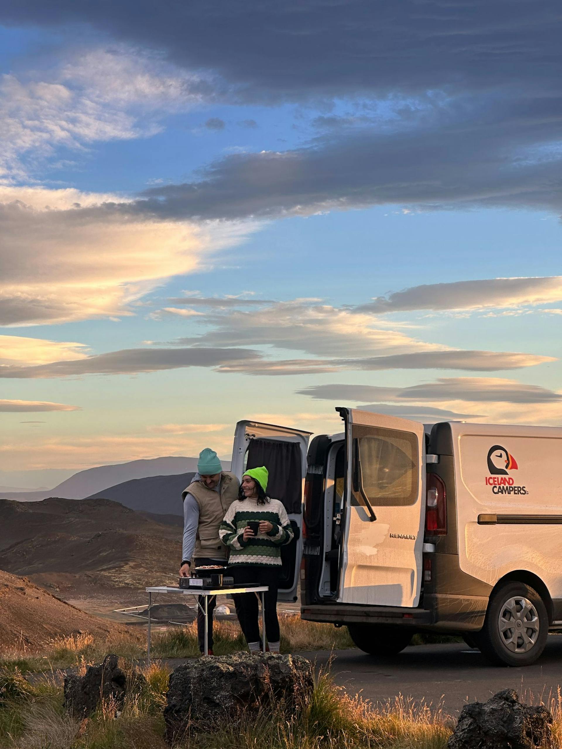 Happy campers enjoying a cup of coffee.