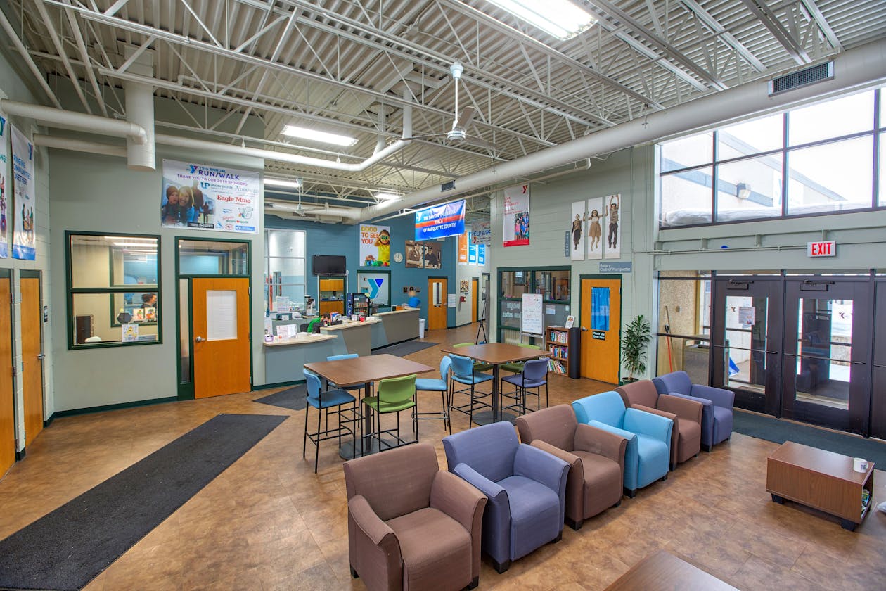 YMCA of Marquette entrance interior with front desk and seating area