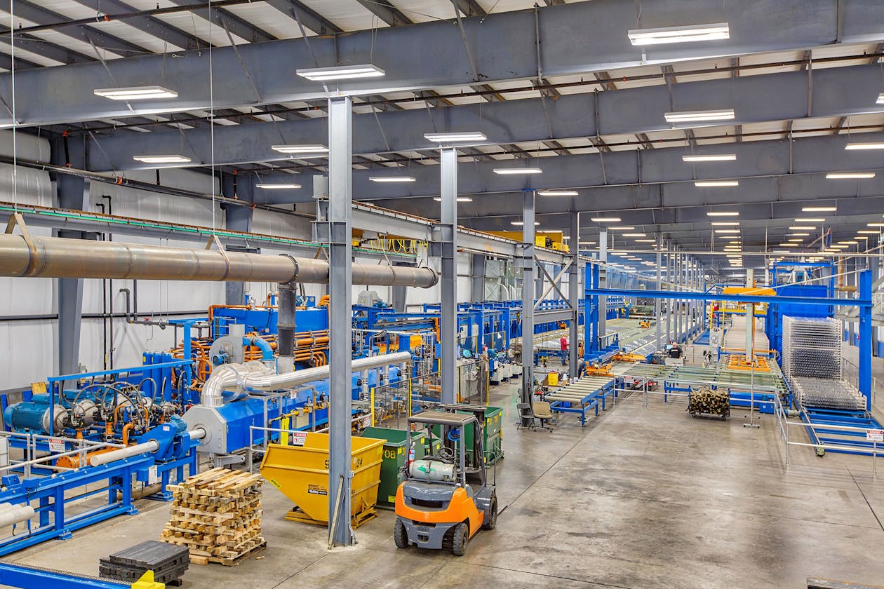 SEI building interior with machinery and forklift