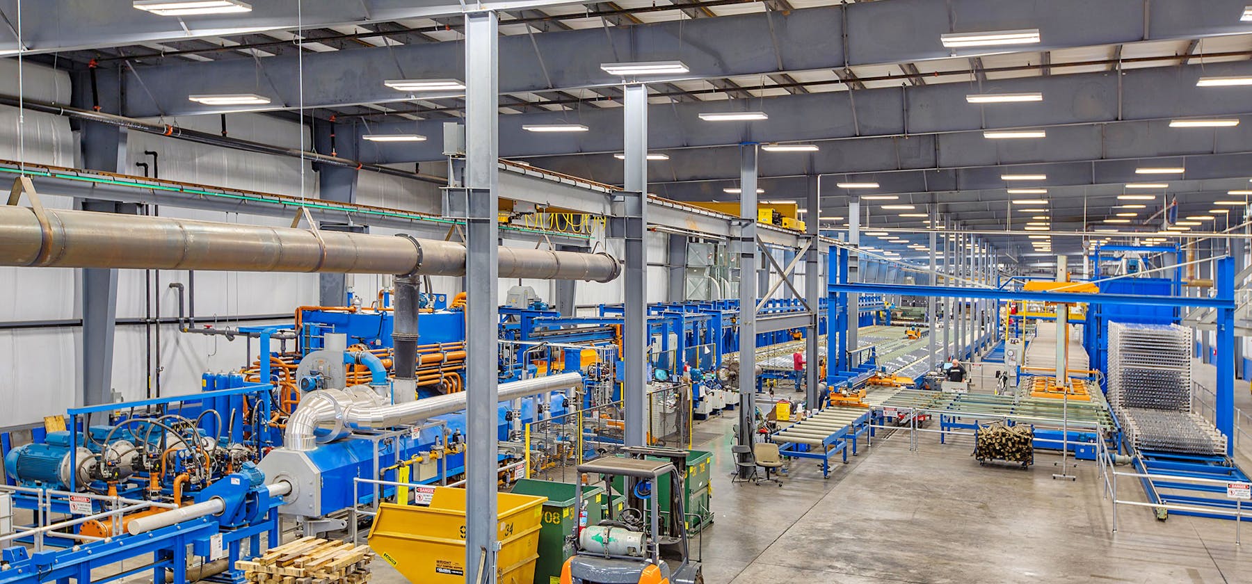 SEI building interior with machinery and forklift