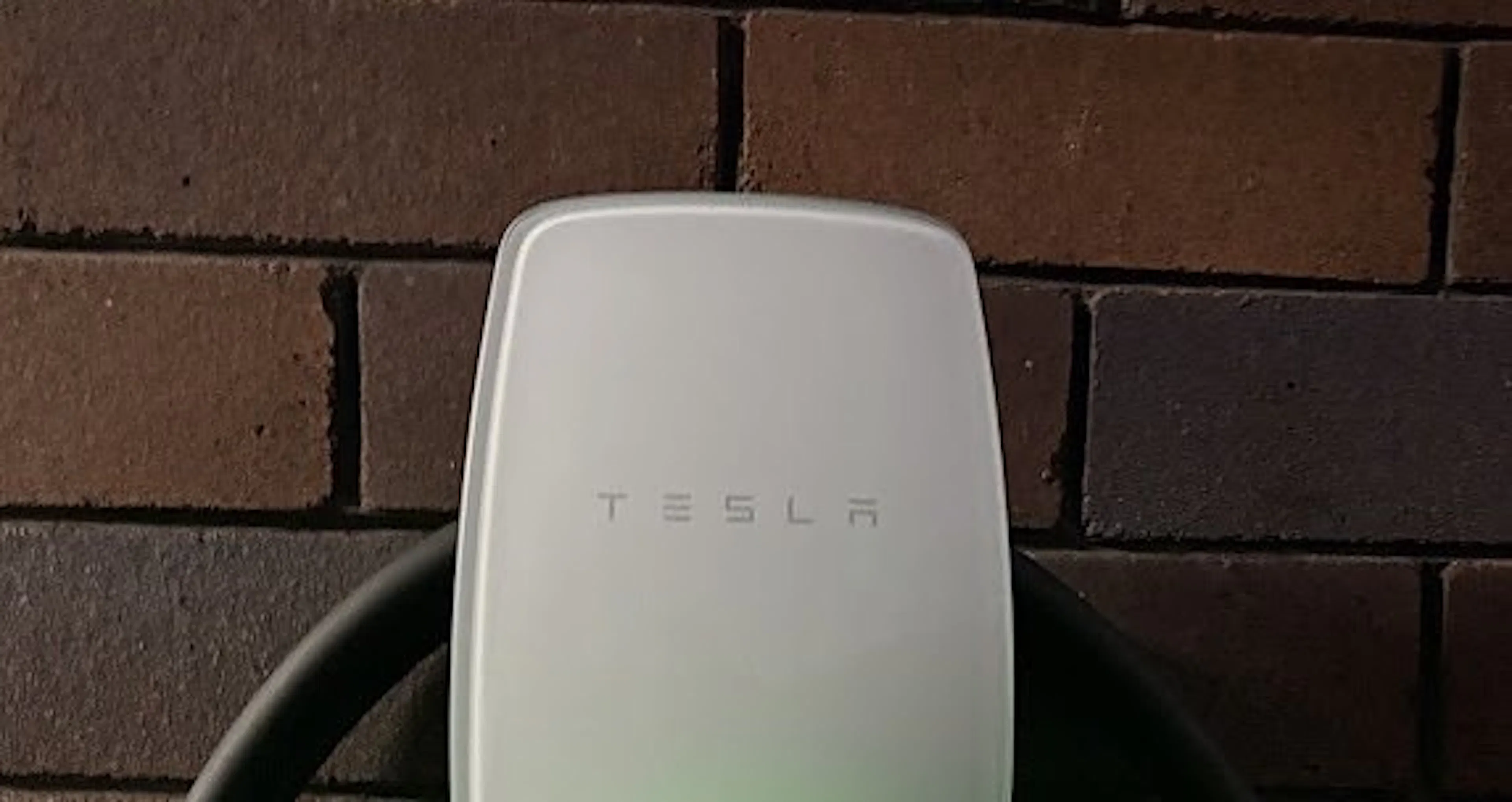 Customer-supplied EV charger mounted on a garage wall in Burwood, by Impulse Electrical Enterprise