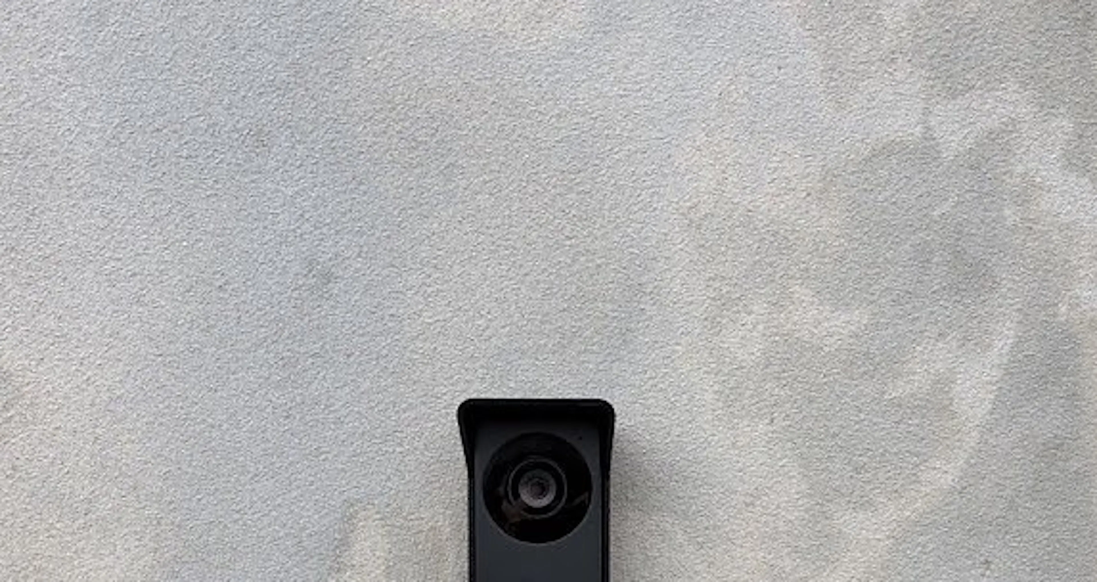 HiLook video intercom doorbell on a rendered wall in Annandale, by Impulse Electrical Enterprise