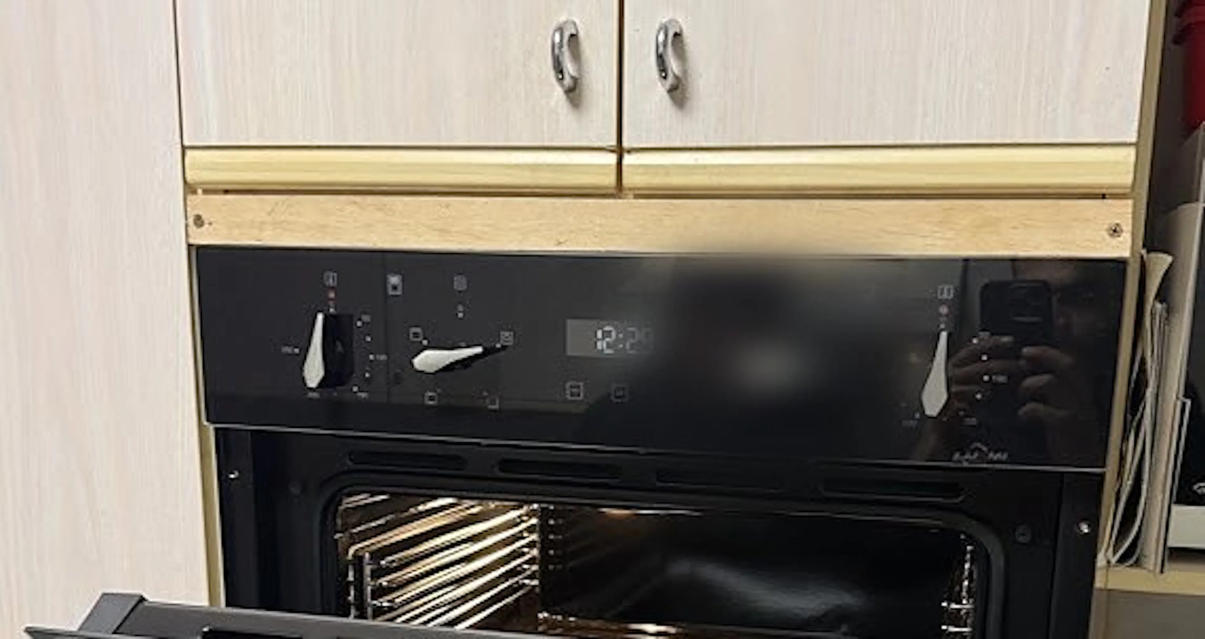 New 60cm oven with the door open in a Croydon Park kitchen, by Impulse Electrical Enterprise