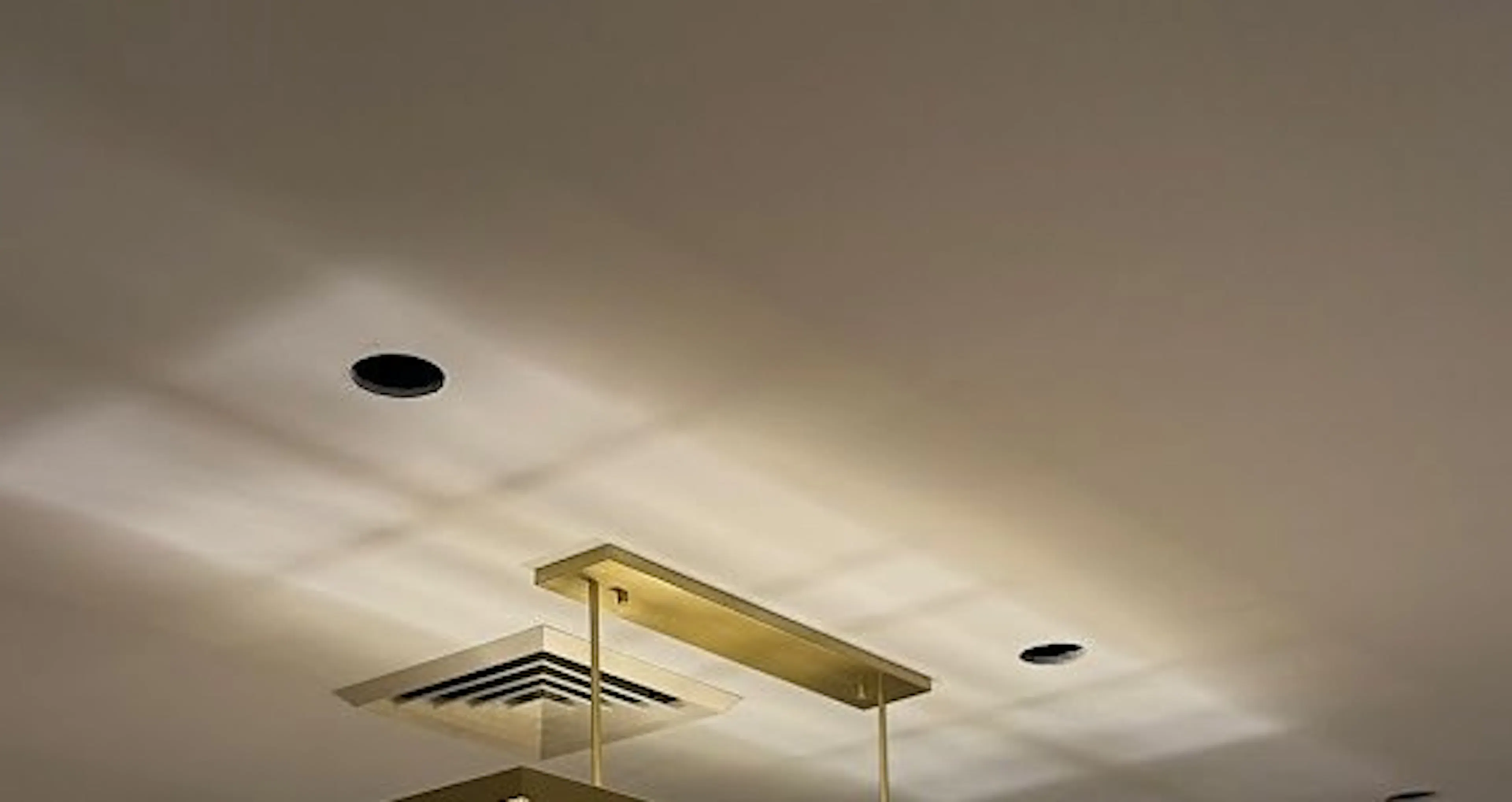 Rectangular pendant light and downlights in an Earlwood dining room, by Impulse Electrical Enterprise
