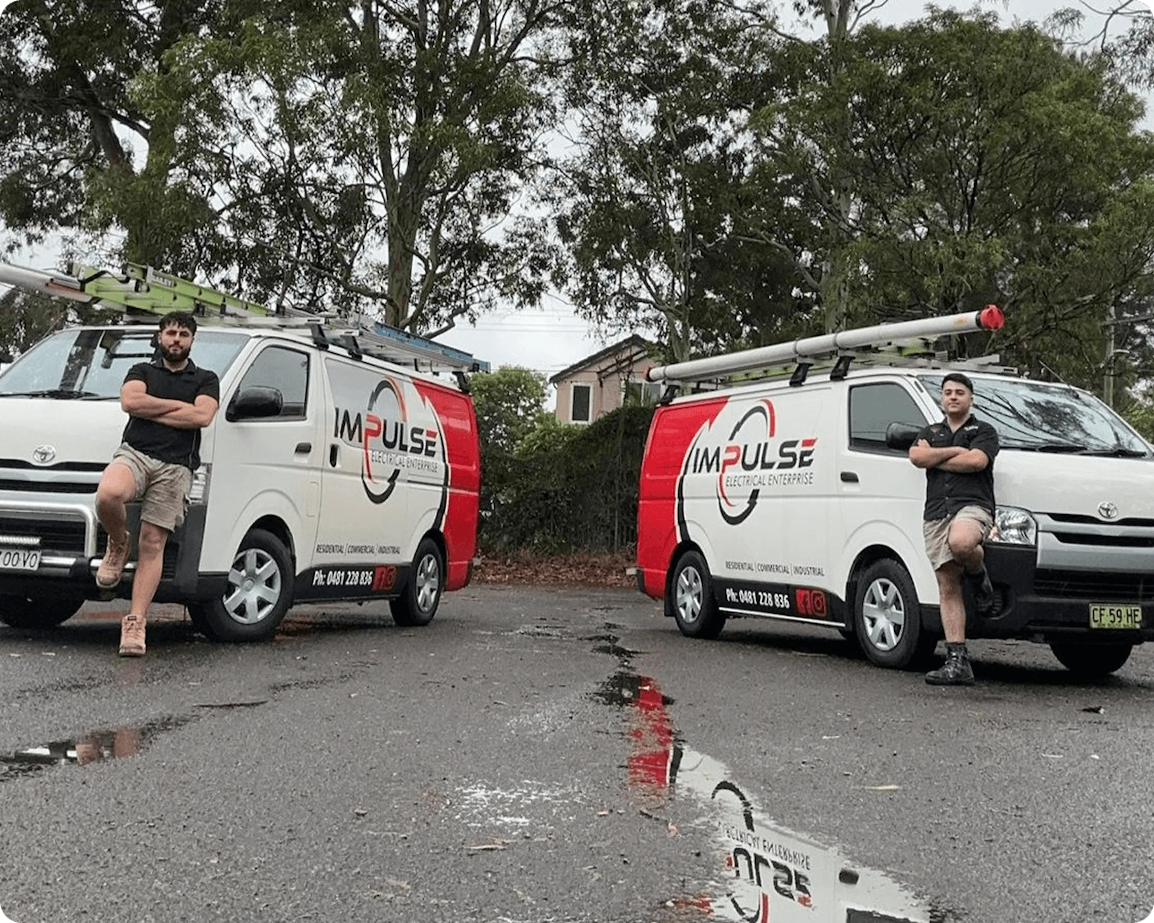 The Impulse Electrical Enterprise team with their branded vans