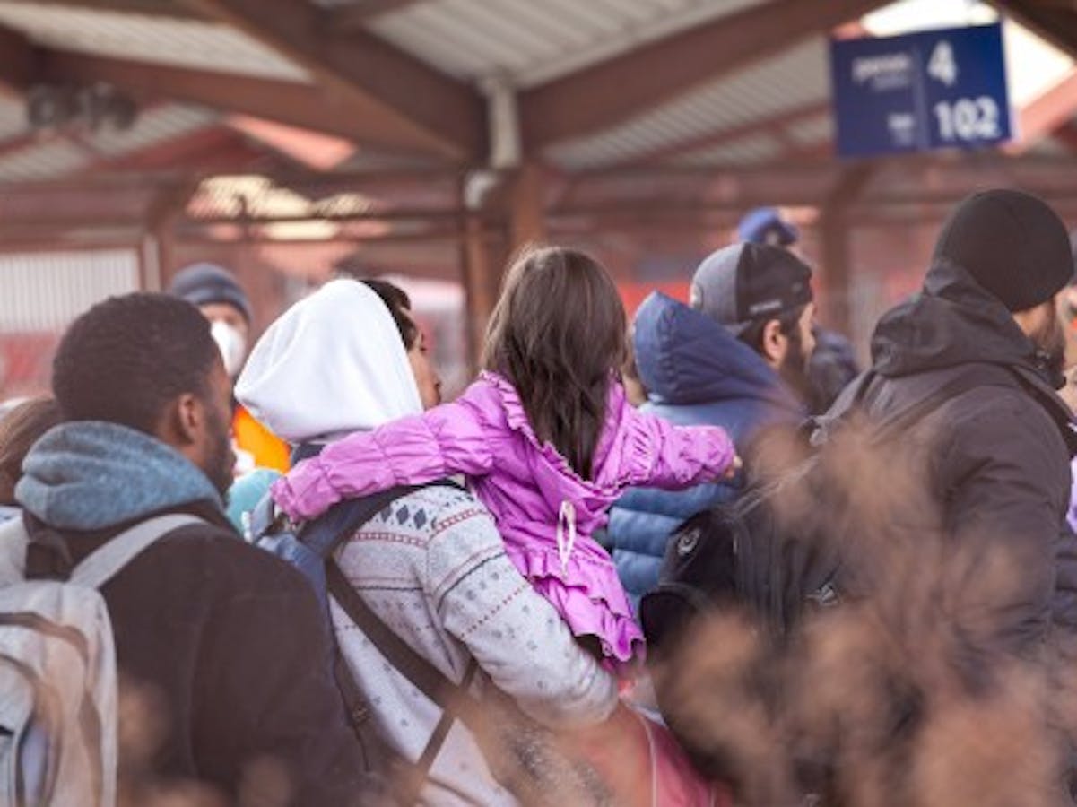 People gathering at train station