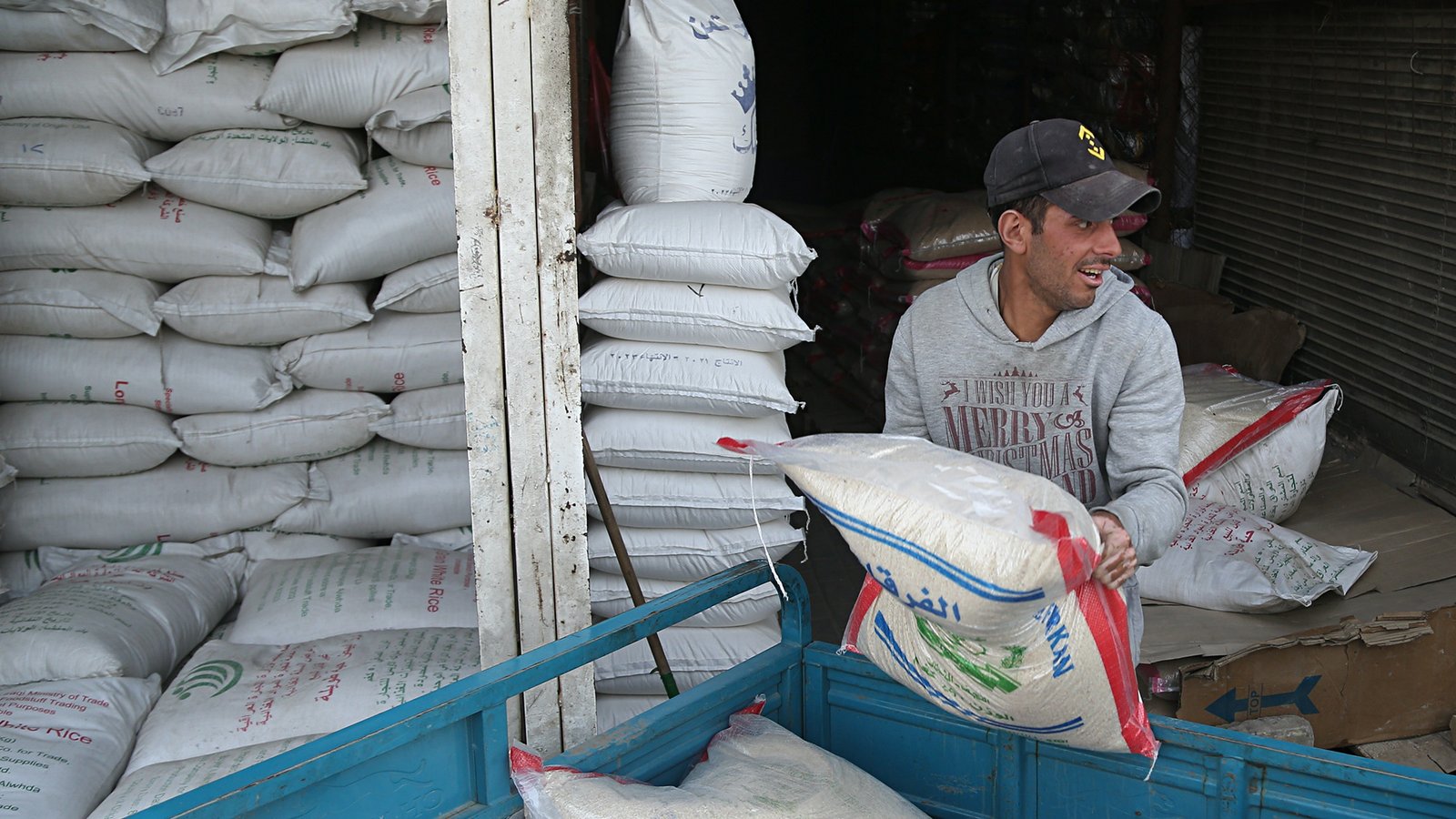 man loading food into truck in Ukraine