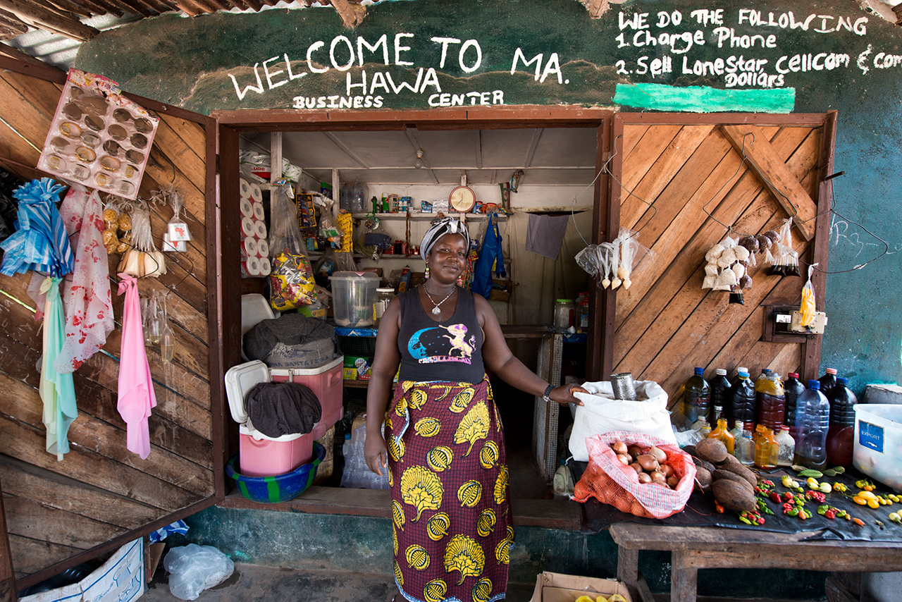 woman selling wares from her shop