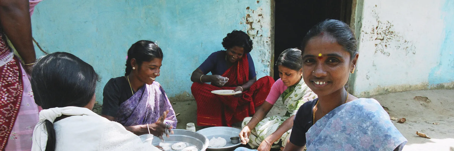 Women work on home-made production of biscuits. They are part of a rural cooperative in Kesavarayanpettai, India.