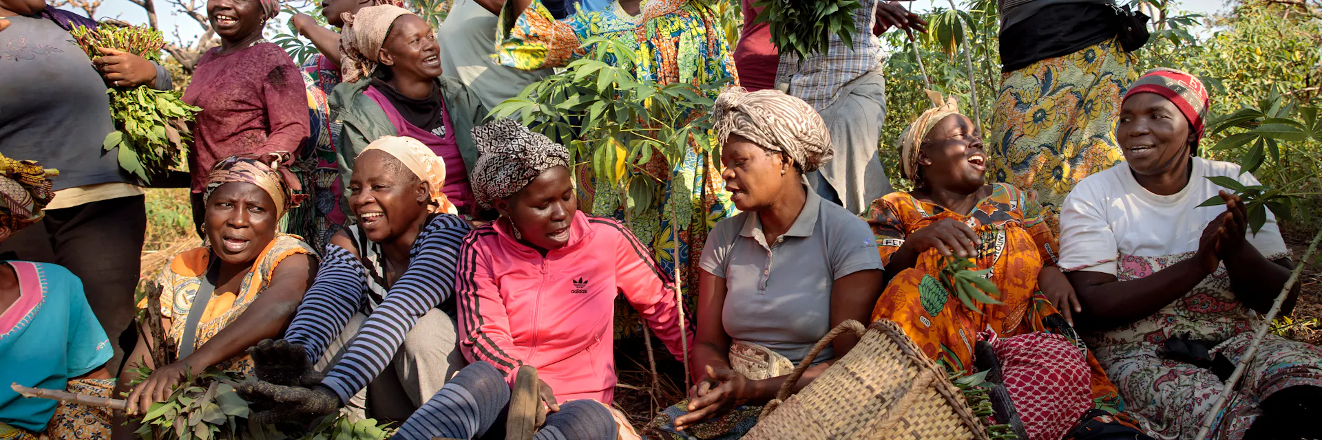 Women sing and clap their hands. They are part of a women’s cooperative in the township of Yoko, Cameroon called SOCCOMAD.
