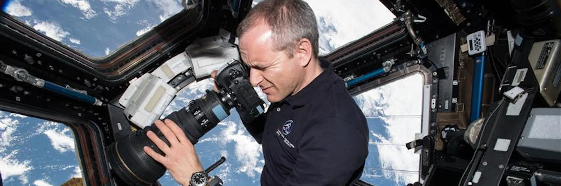 Astronaut David Saint-Jacques takes a picture through a window in the Cupola of the International Space Station