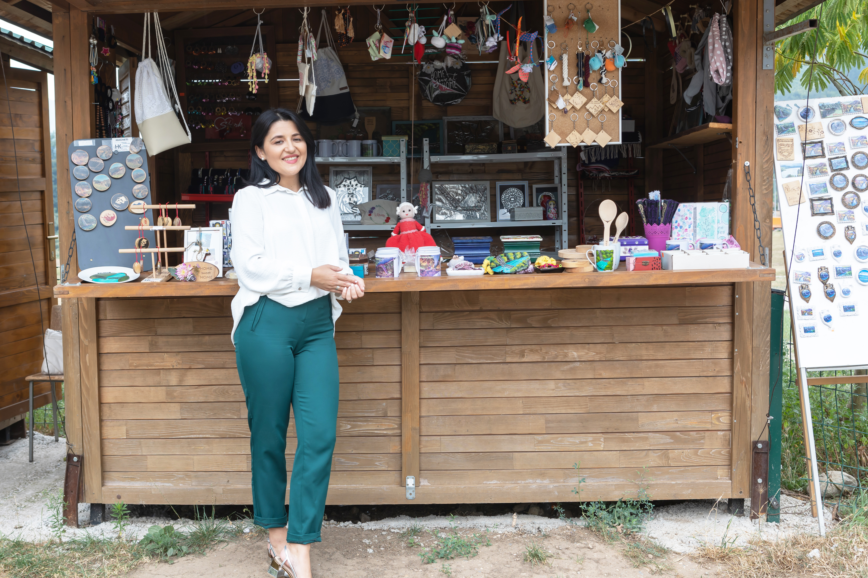 Merima at a souvenir stall stocking her company’s products.