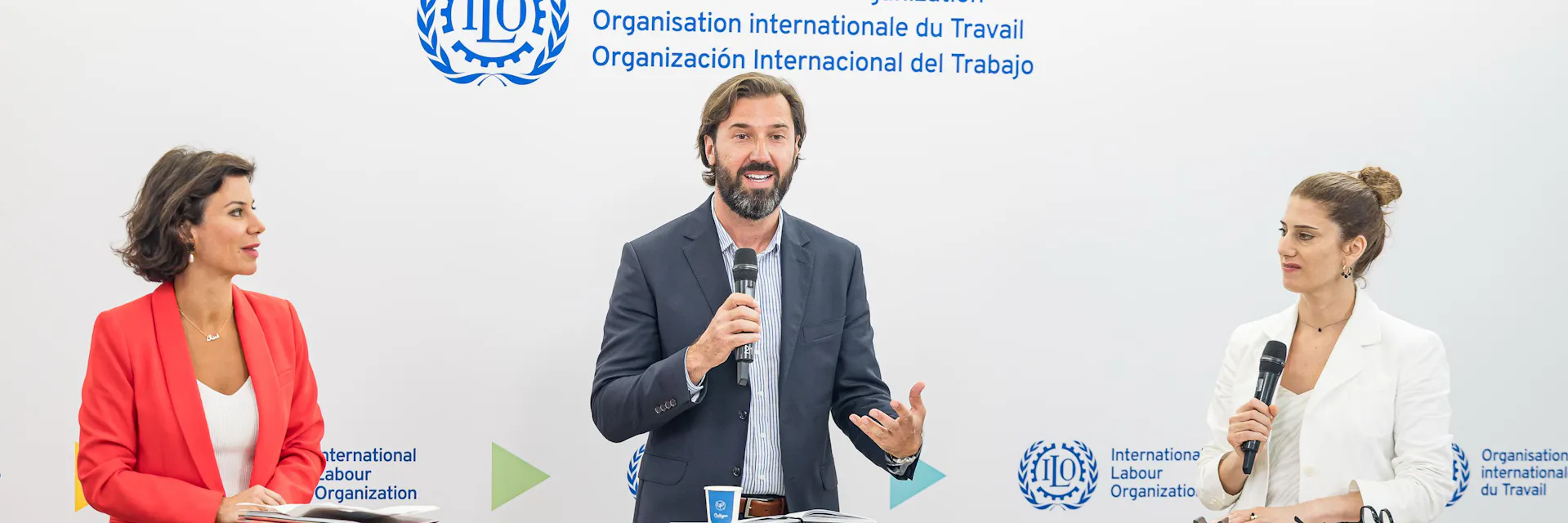 Manal Azzi, Pawel Gmyrek and Zeina Awad participate at a live discussion at the 113th International Labour Conference, which was recorded for the ILO's Future of Work podcast.