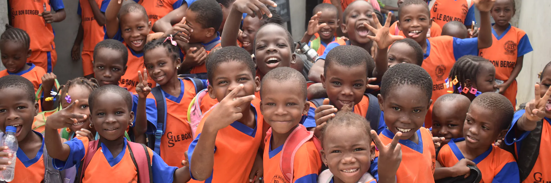 Primary school children heading home after school in Yopougon, Côte d'Ivoire