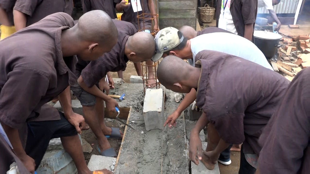 Prisoners at the jail in Antalaha learn to make cinder blocks.