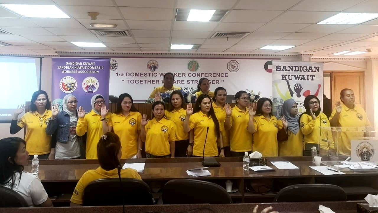 A group photo of domestic workers at the first congress of the Sandigan Kuwait Domestic Workers Association.