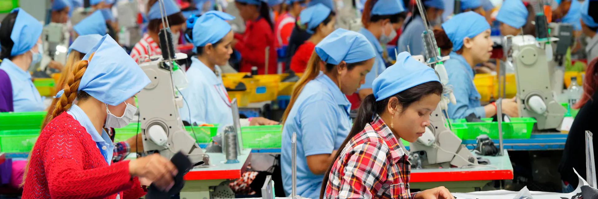 Cambodian workers at work in a local footwear manufacturing plant.