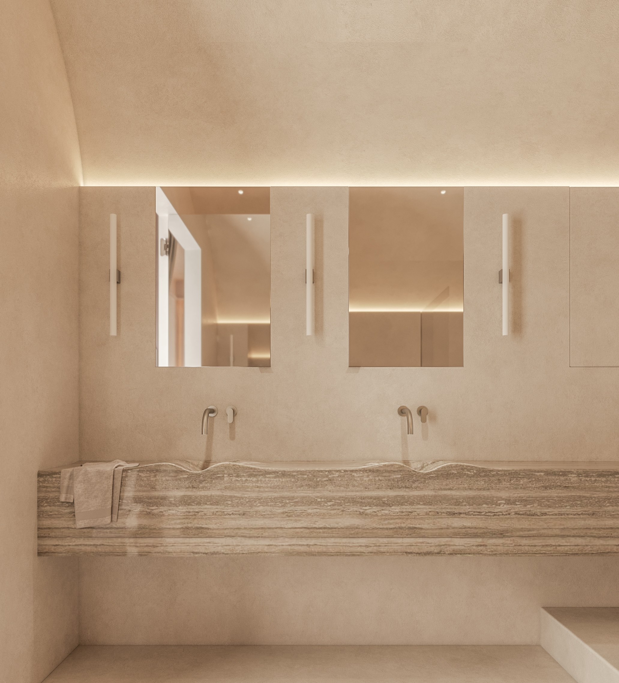 Minimalist double sink vanity in beige stone with modern mirrors and soft indirect lighting.