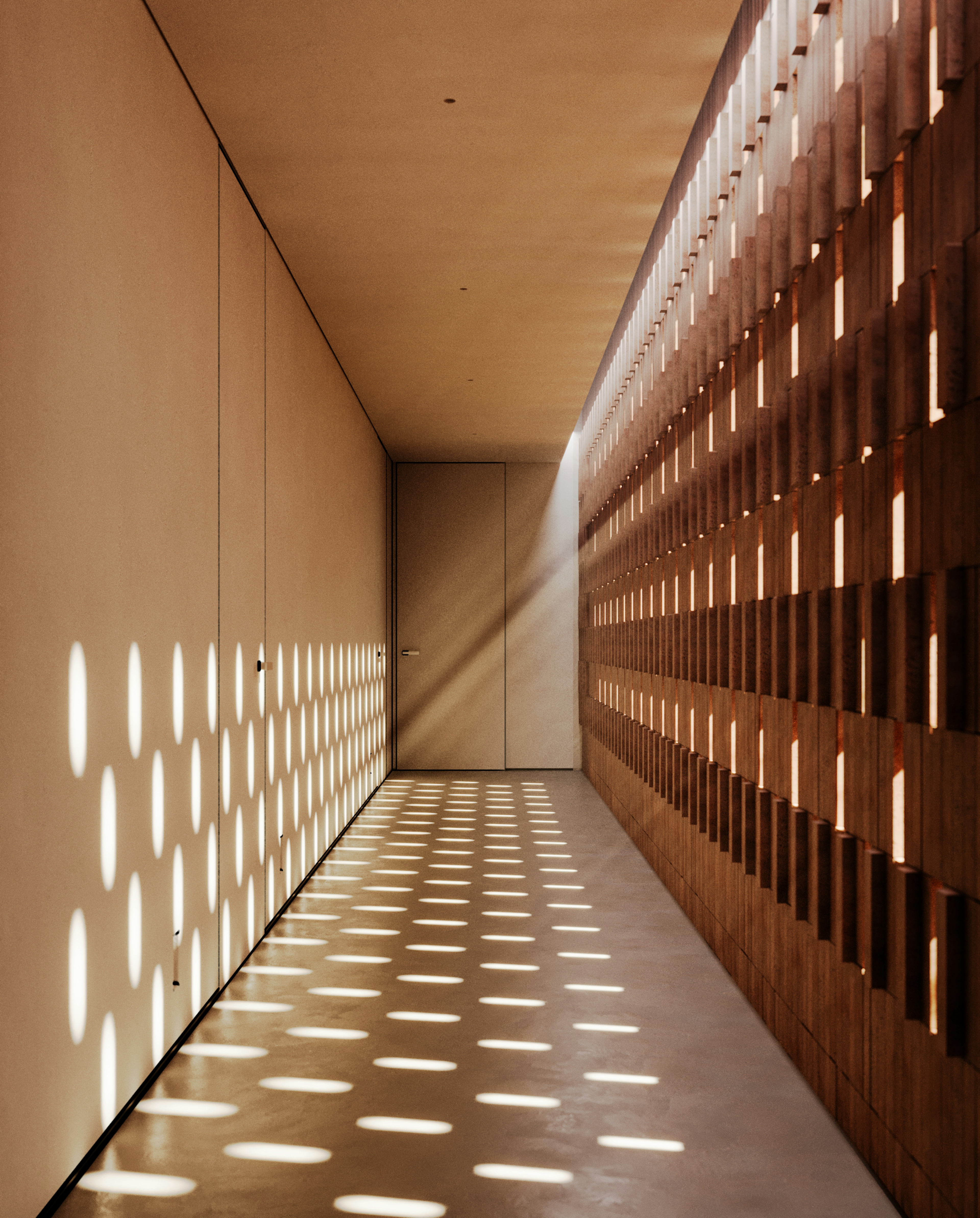 Long corridor with perforated brick wall casting patterned light across the floor.