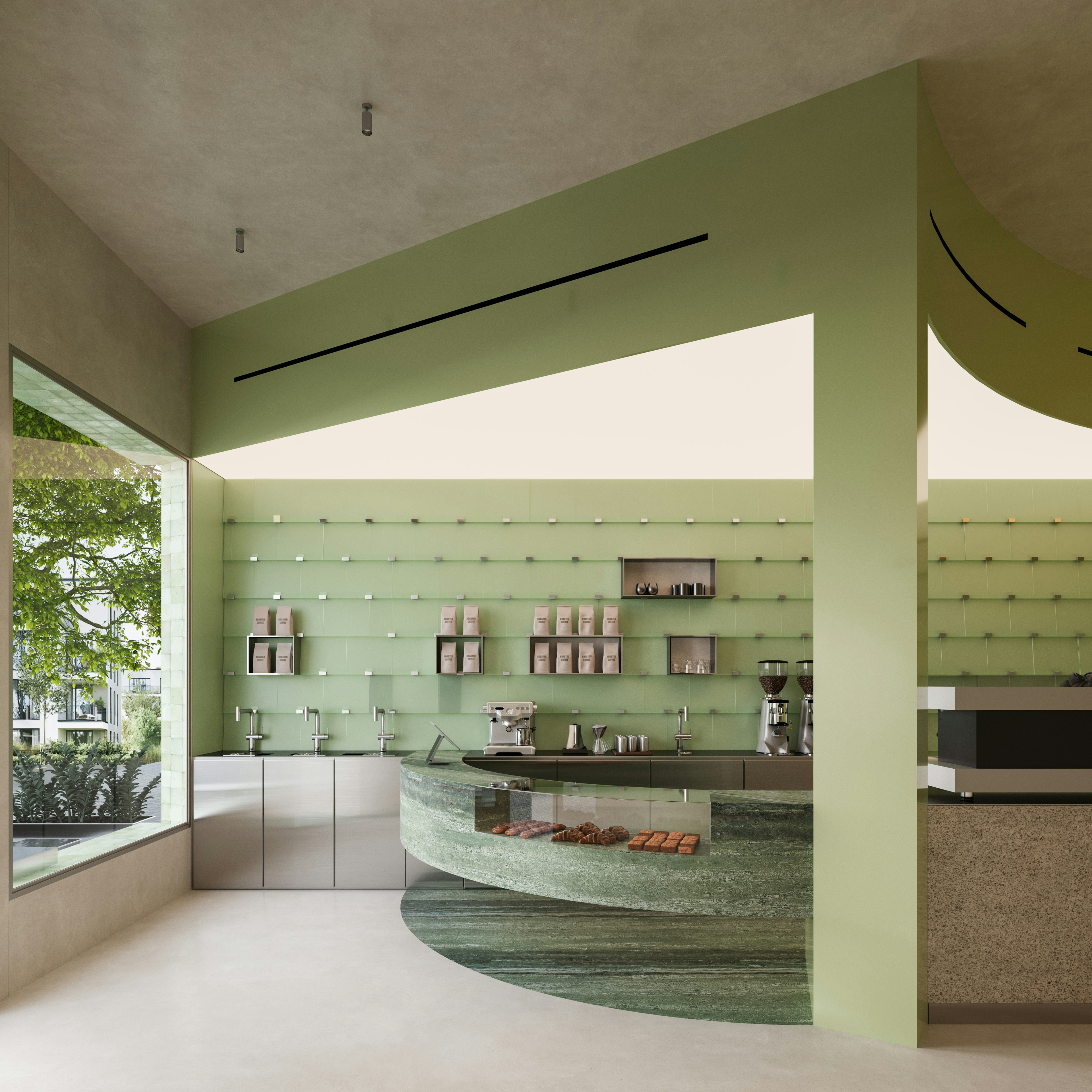 Wide view of the café where the sculptural bar and open preparation area define the identity of the space, highlighted by translucent green wall panels and soft natural light.