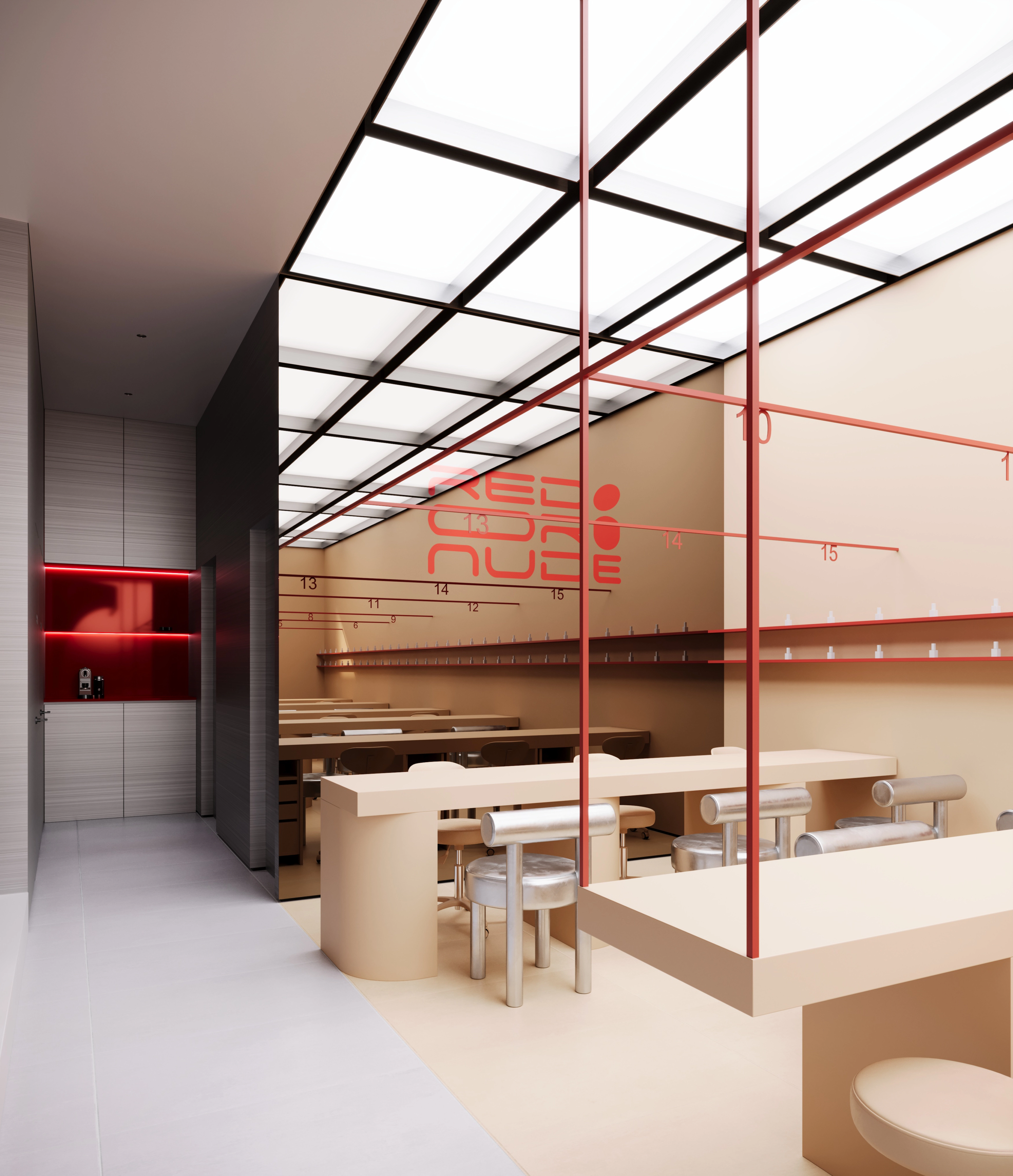 Modern nail salon nail area with manicure tables and chairs beneath a luminous grid ceiling and red-framed glass partitions.