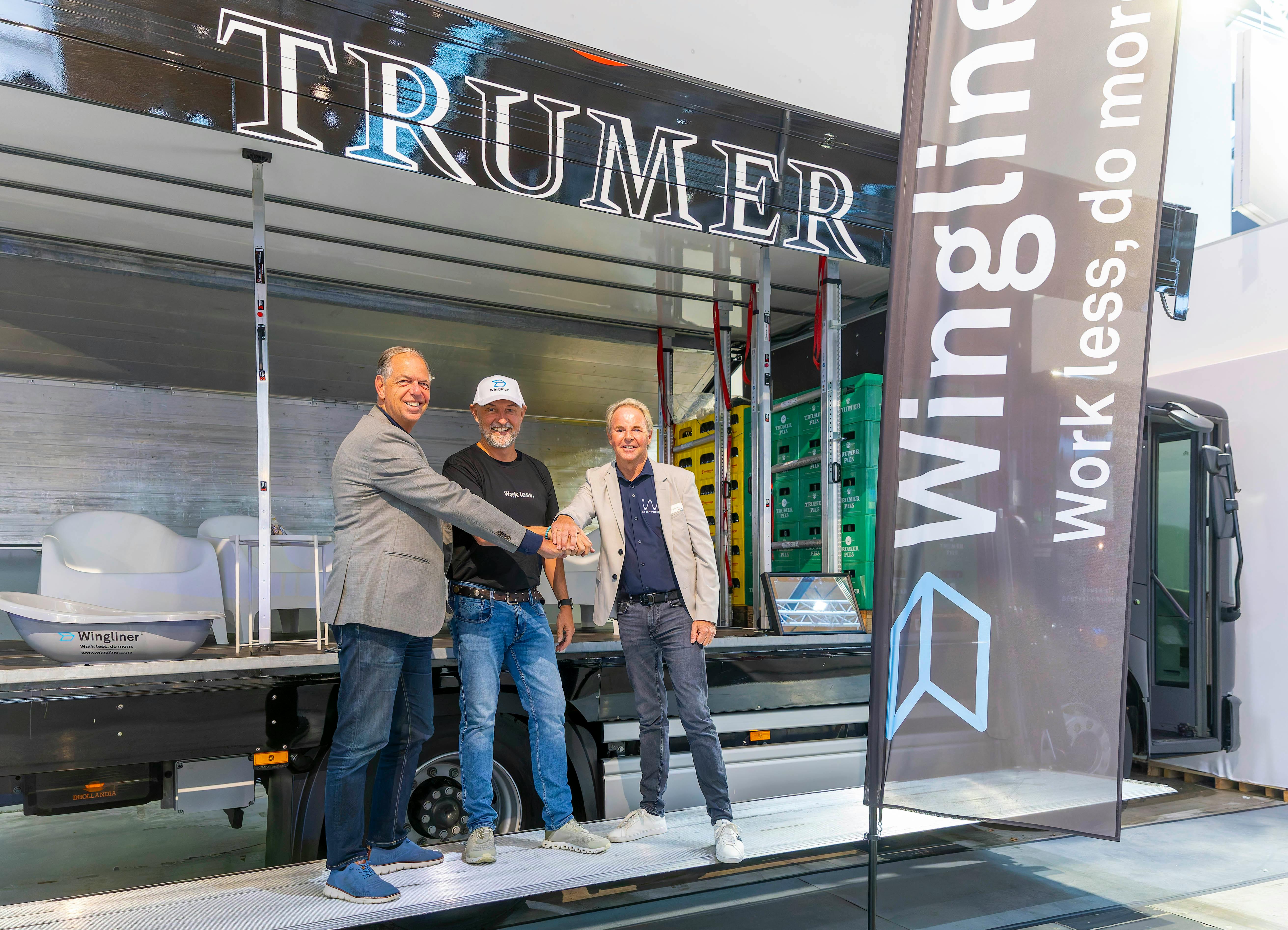 Wingliner and IM Efficiency celebrate their SolarOnTop order at NUFAM event.