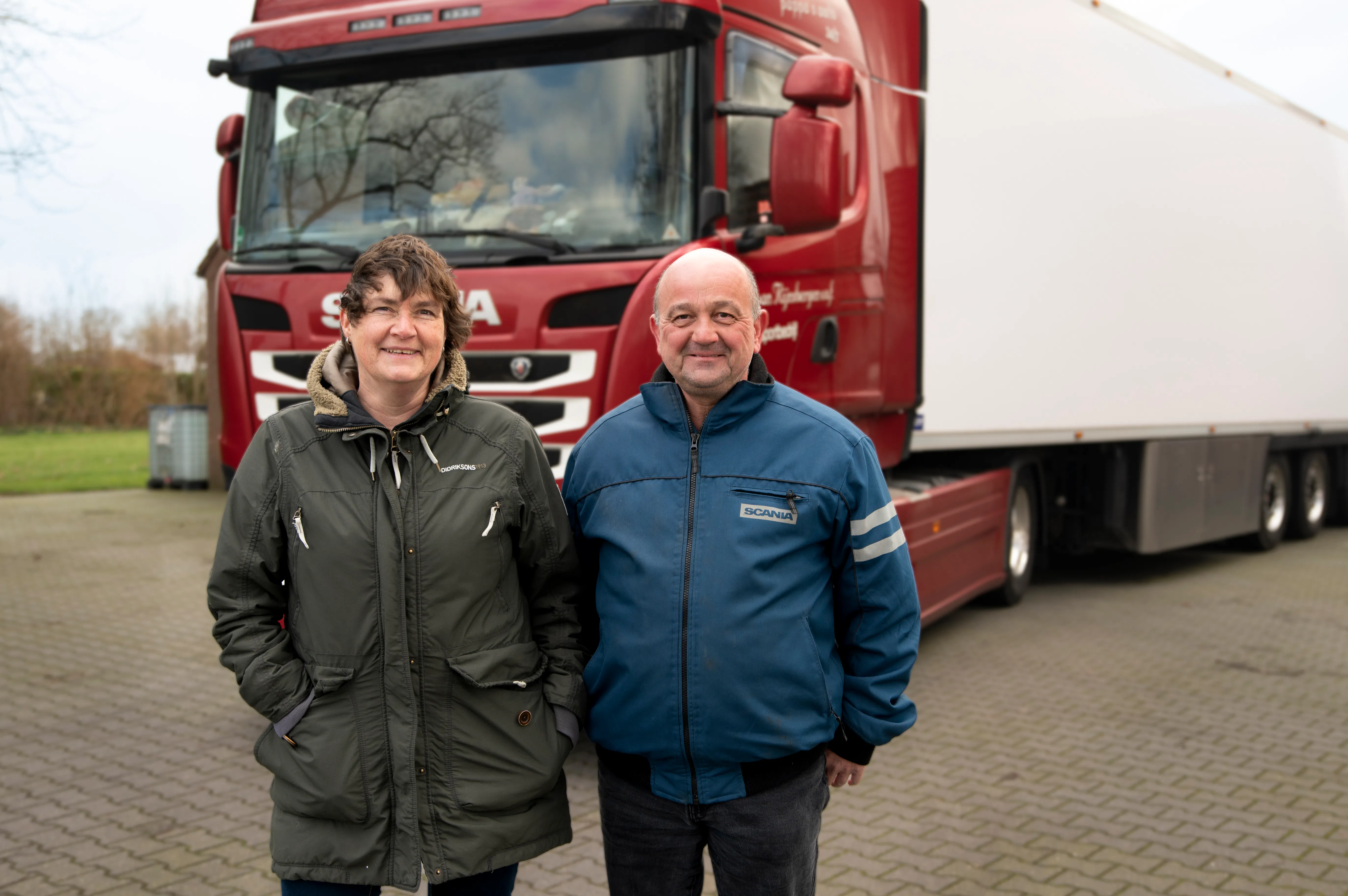 Truck equipped with SolarOnTop solar panels generating renewable energy to power truck cabins.