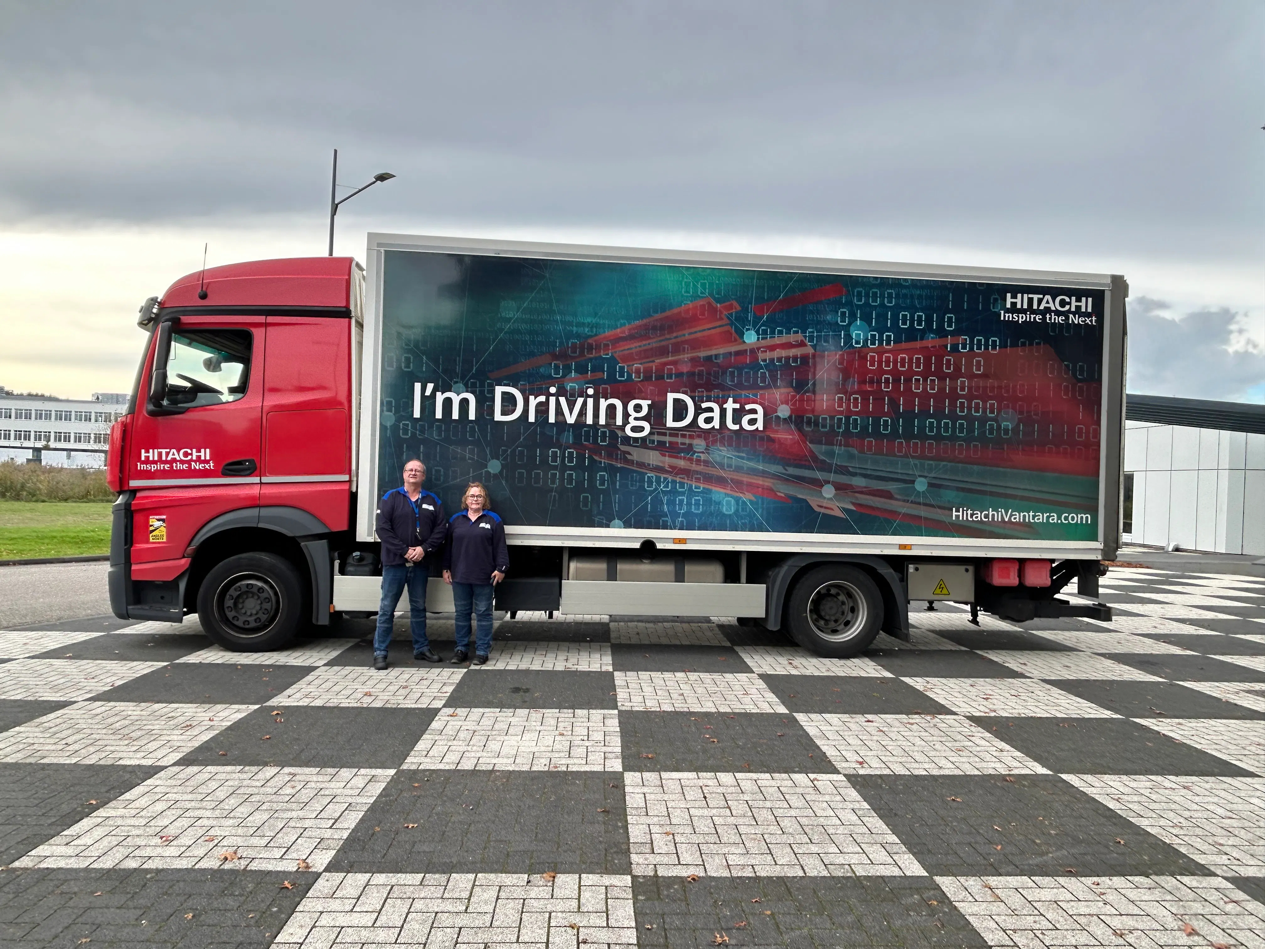 Truck driver relaxing in a solar-powered cabin, reducing fatigue and improving rest quality.
