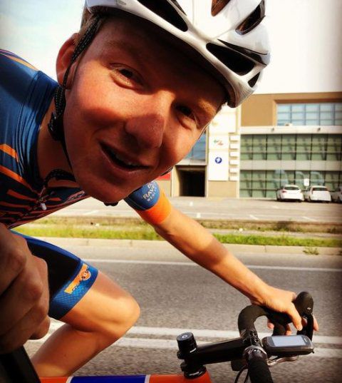 Close up of Tims face whilst he is riding his bike