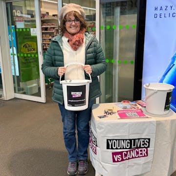 Wendy at her bucket collection