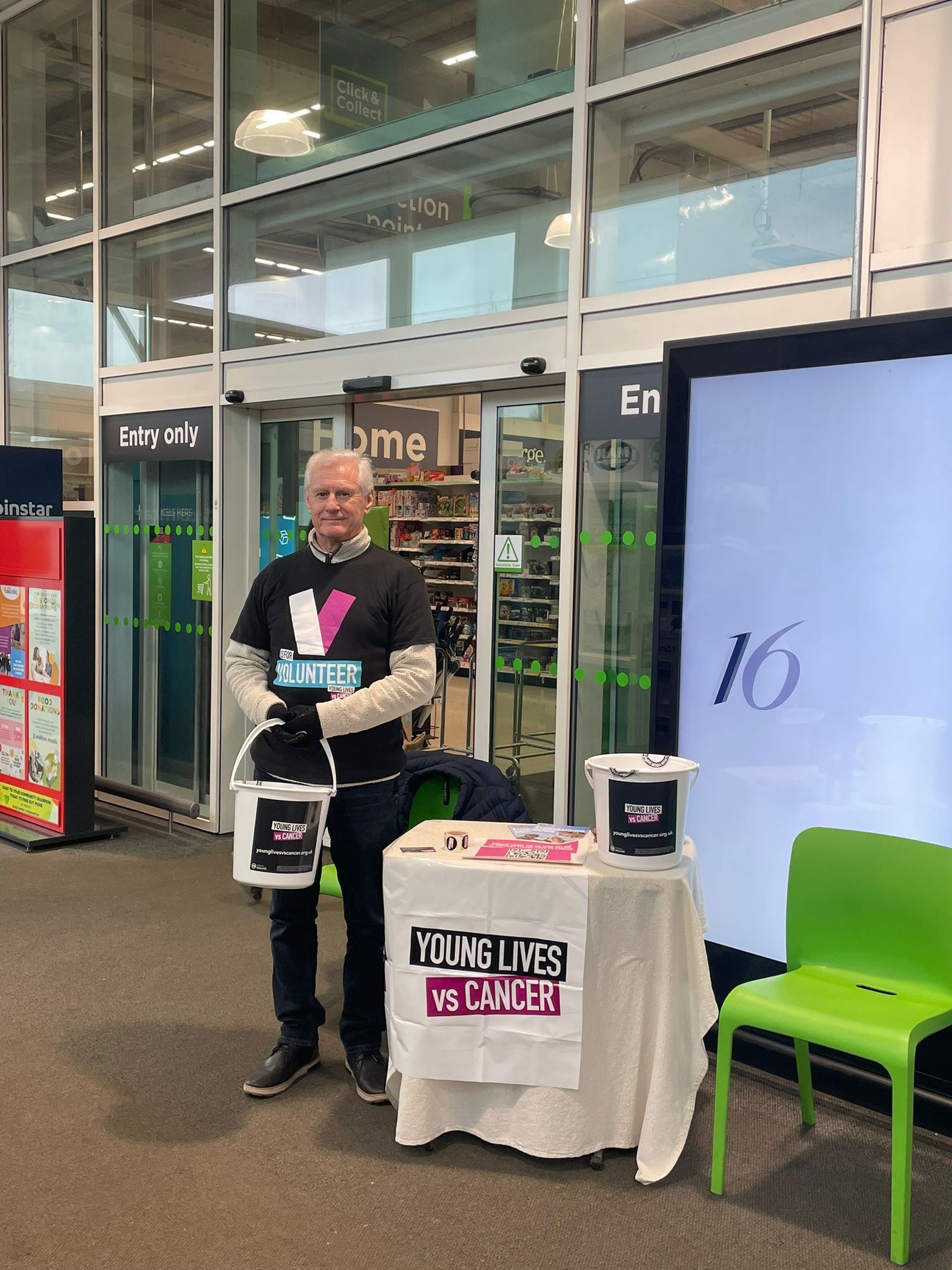 Chris at their bucket collection