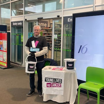 Chris at their bucket collection